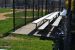 Spectator/player seating.  Benches in dugout not present at time of photo.